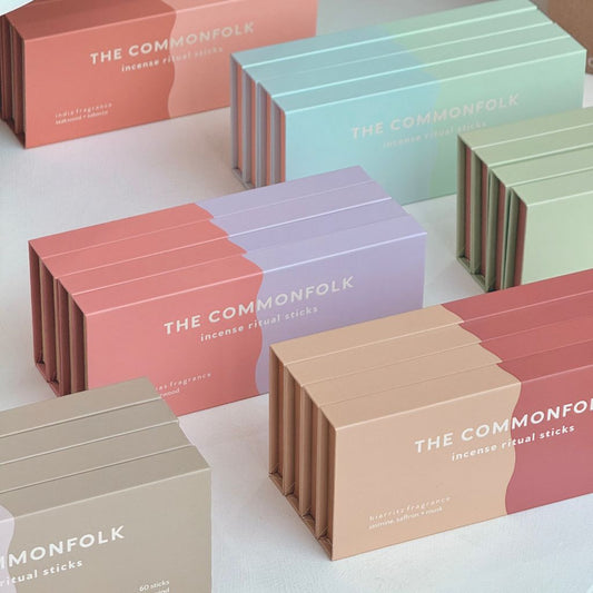 Collection of 'The Commonfolk' incense ritual sticks boxes in various colors on a white background.
