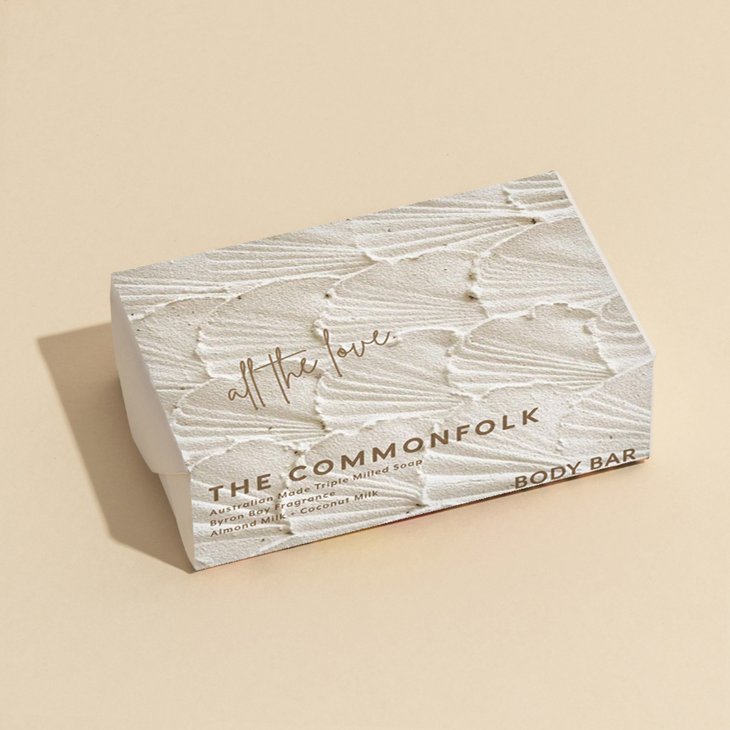 The Commonfolk 200g body bar soap with 'all the love' written on it,and has a Shell Drift design.