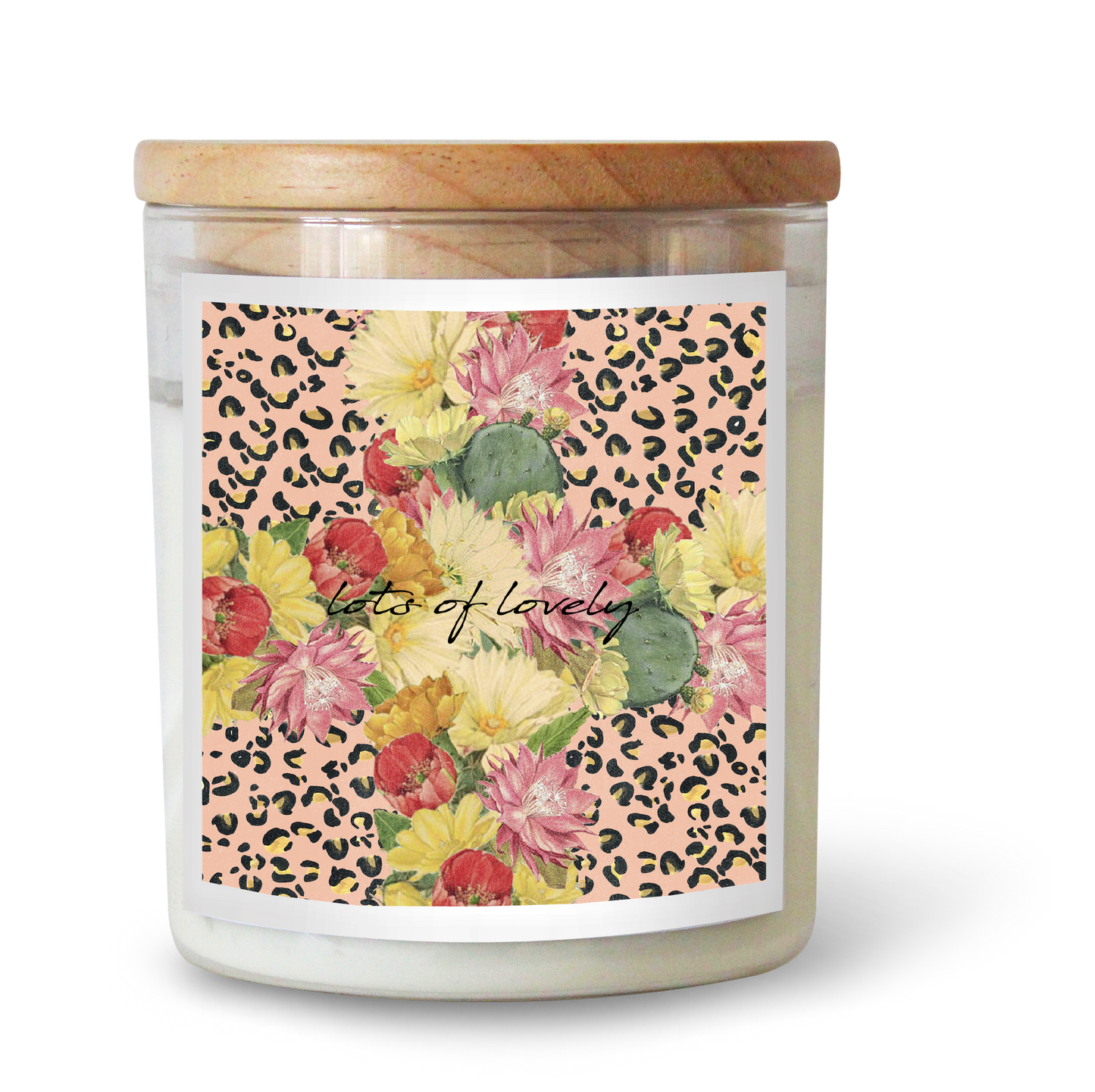 The Commonfolk scented candle has a floral pattern on its label, featuring a mix of flowers and the text 'Lots of Lovely.' The label is predominantly pink with a leopard print design around the edges.