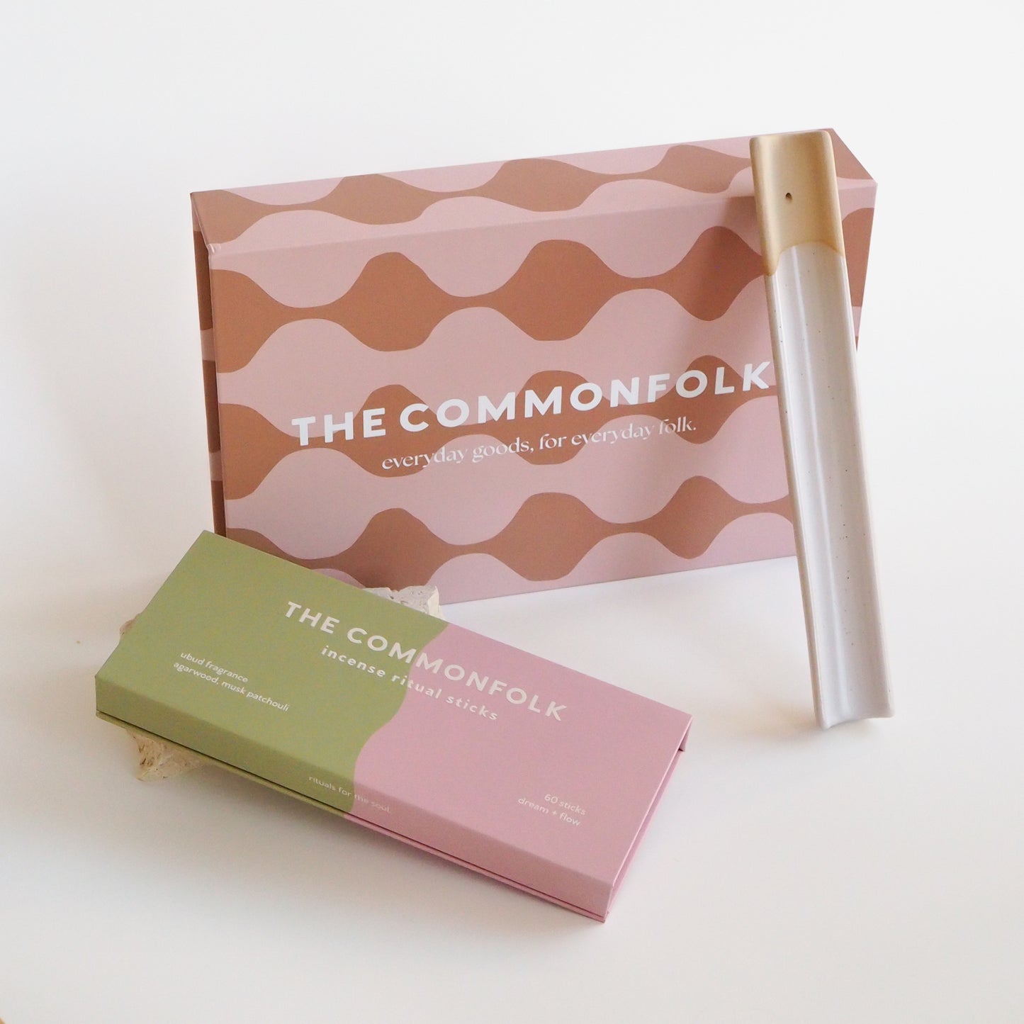 The Commonfolk limited edition incense gift box with 'Waves' and 'Splice' incense ritual sticks and a holder, packaged in a box with a wave pattern design.