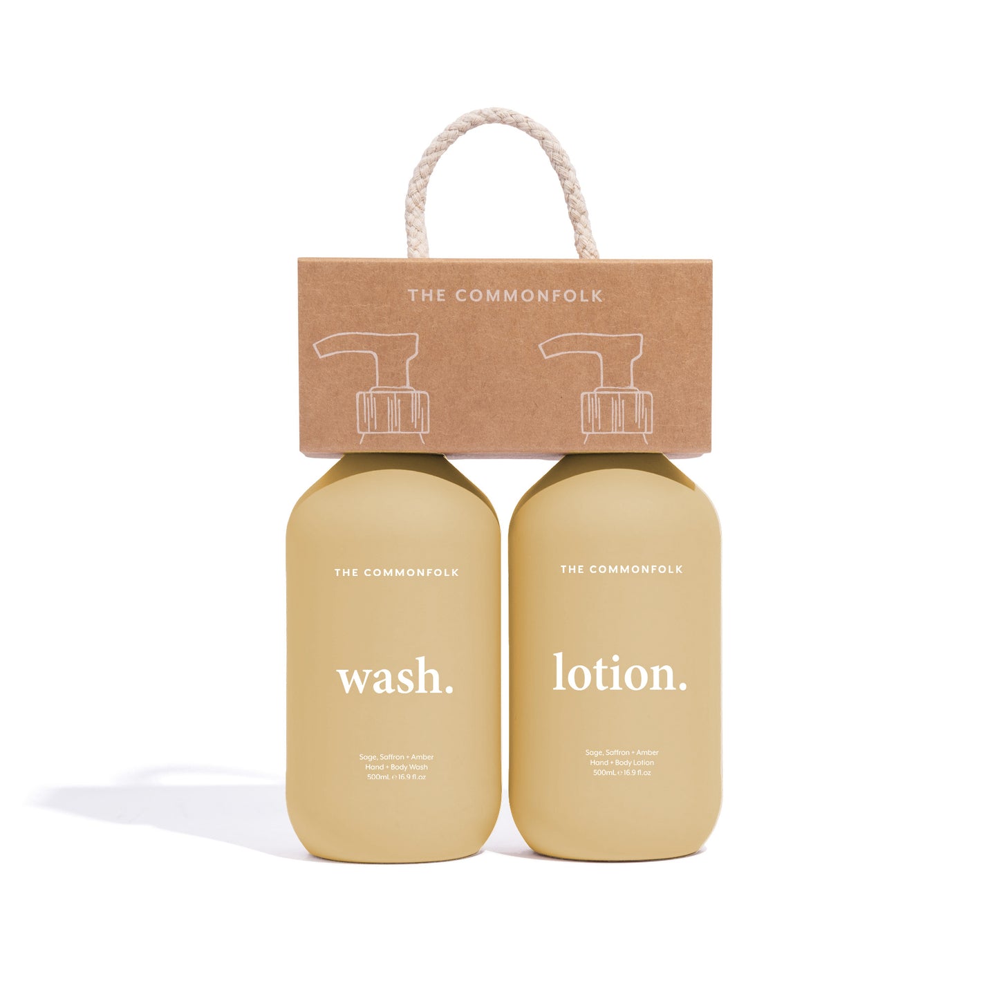 The Commonfolk two yellow matte finish 500ml bottles labeled 'wash' and 'lotion', respectively, with a recycled Kraft carry caddy on top featuring a rope handle.