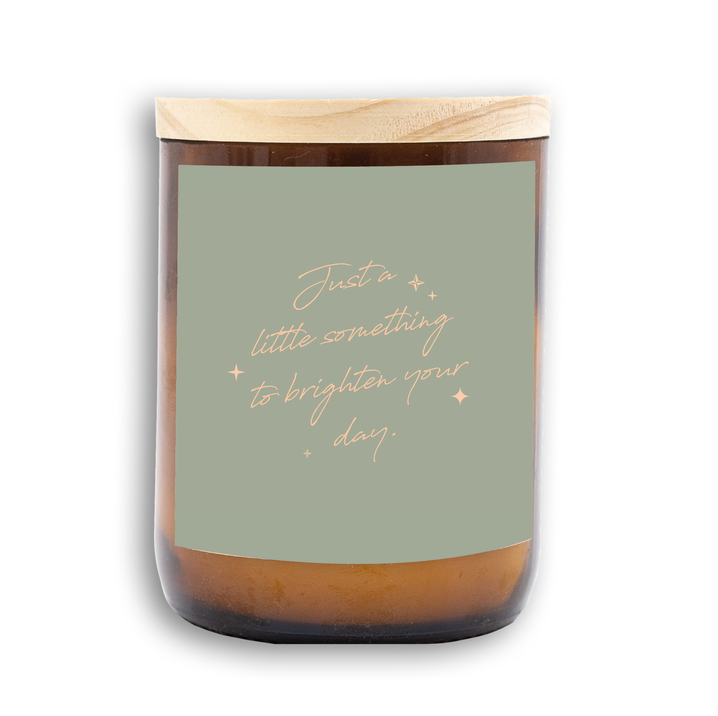 The Commonfolk scented amber jar candle with a wooden lid and a label that reads 'Just a little something to brighten your day.'