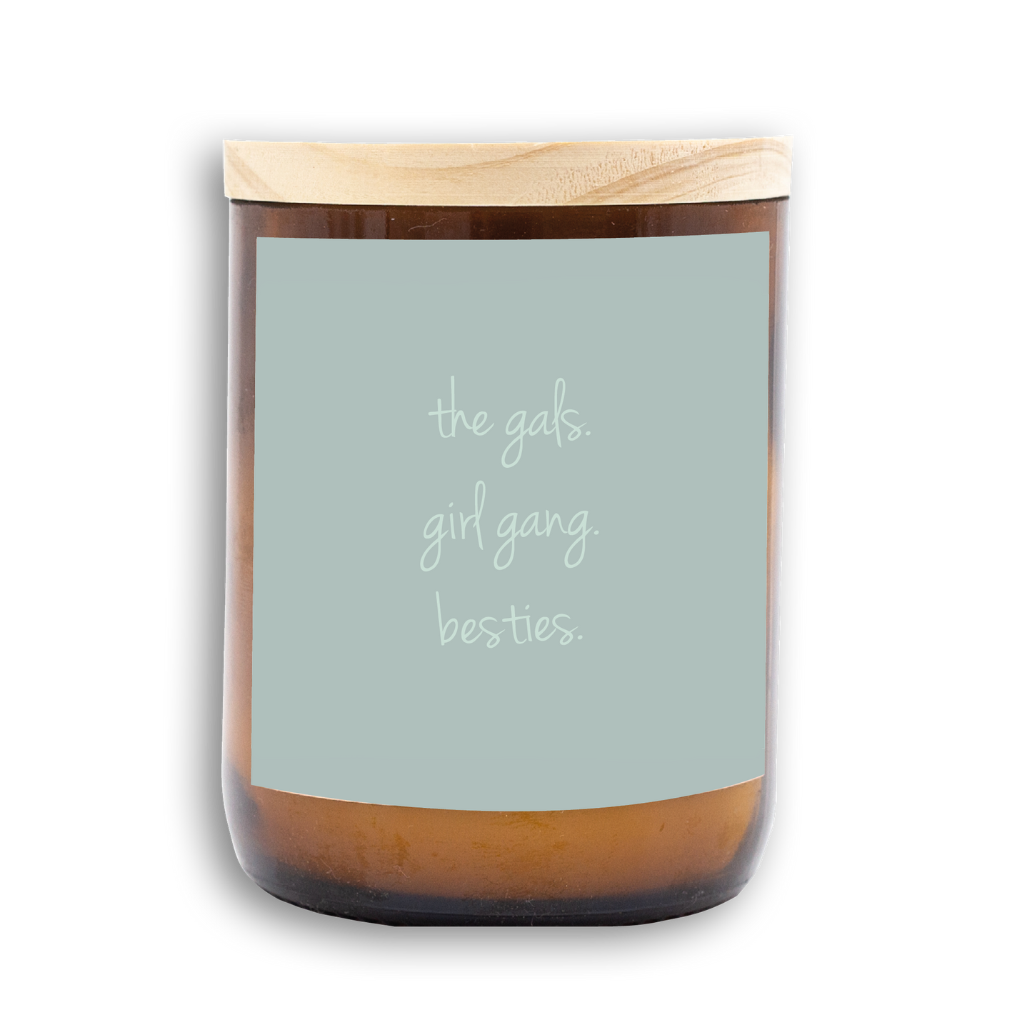 The Commonfolk scented candle with a wooden lid, white wax, and a label that reads 'the gals. girl gang. besties.'