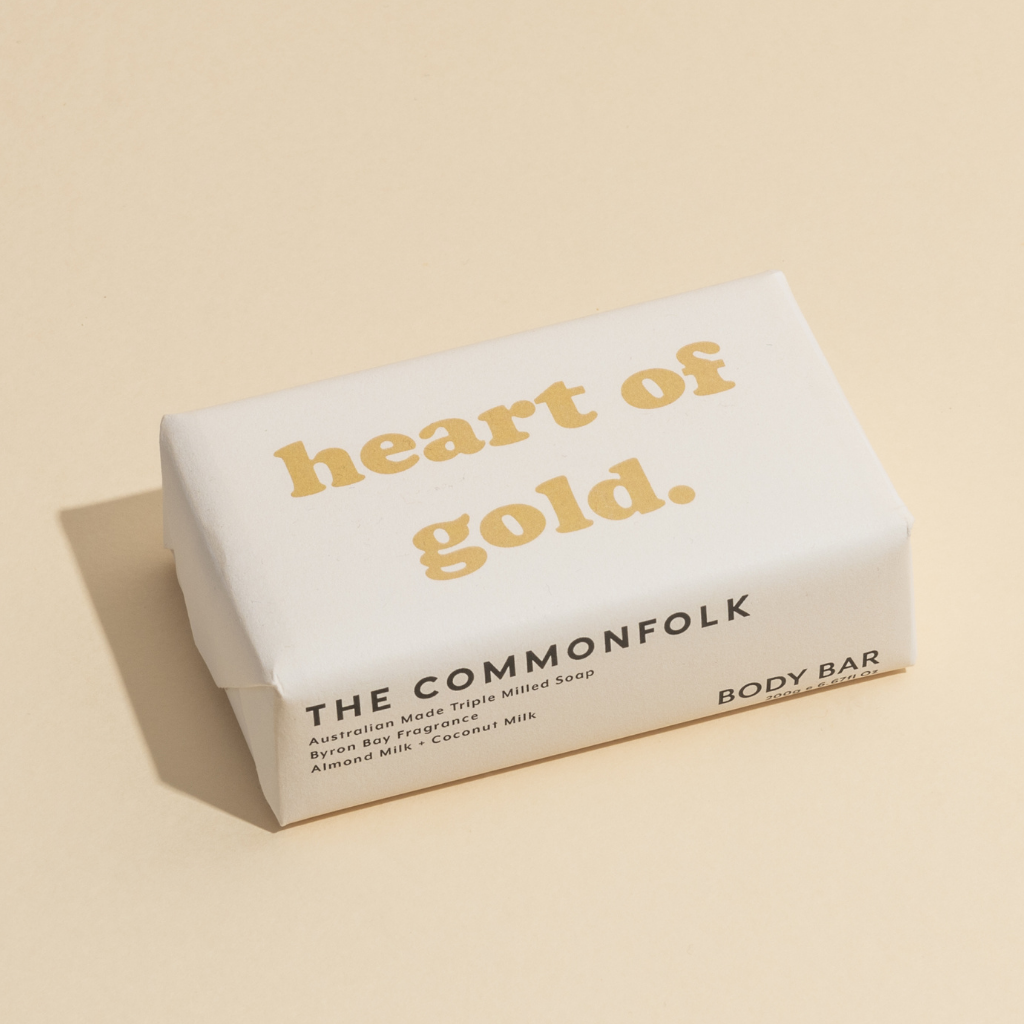 The Commonfolk 200g body bar soap with 'heart of gold' written on the top in simple white packaging.