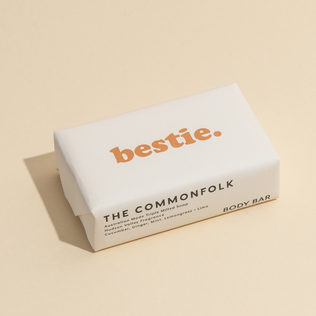The Commonfolk 200g body bar soap with 'bestie.' printed in orange text on the top.