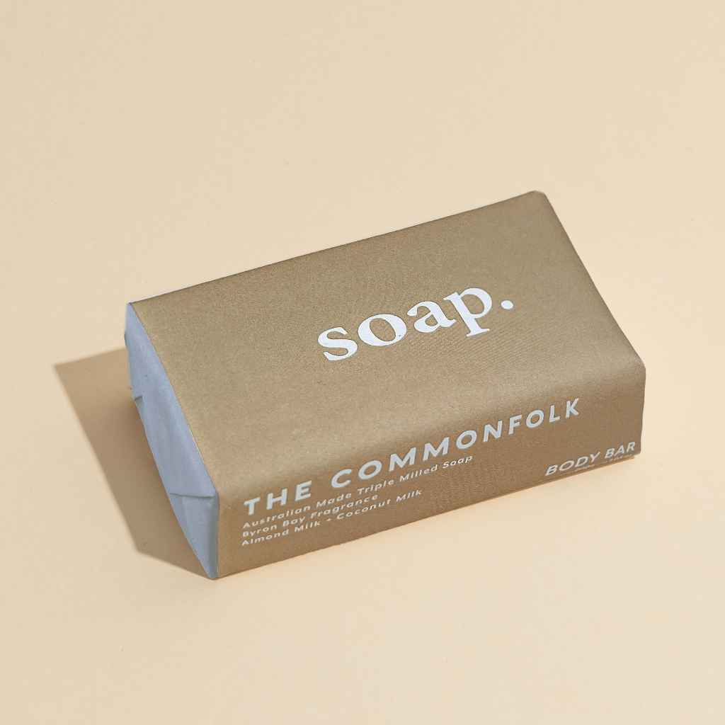 The Commonfolk 200g body bar soap is labeled 'soap' in a tan-colored wrapper.