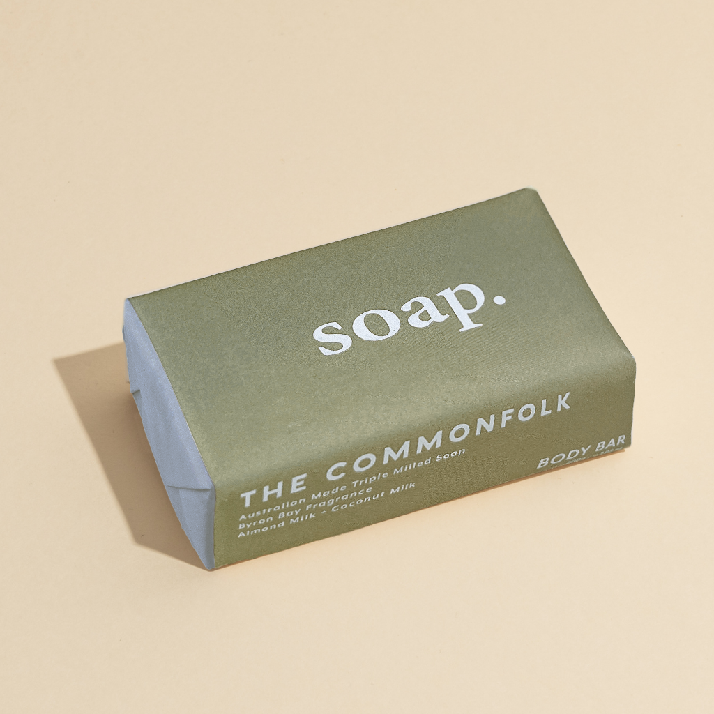 The Commonfolk 200g body bar soap with a green wrapper labeled 'soap' on the top.