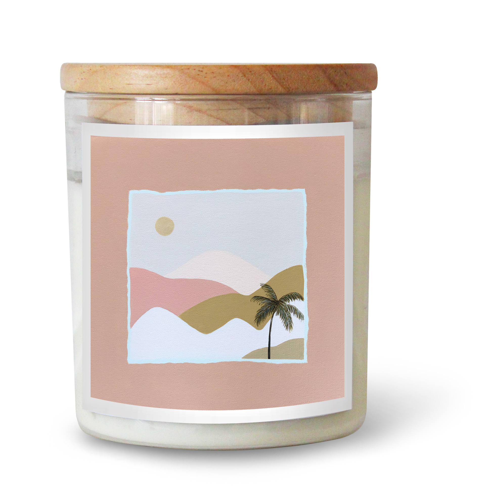 The Commonfolk scented candle features white wax, a wooden lid, and a label with a minimalist illustration of a landscape with hills, a sun, and a palm tree.