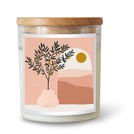 The Commonfolk scented white candle with a wooden lid features a label with a minimalist illustration of a tree and abstract shapes in pink and beige tones.