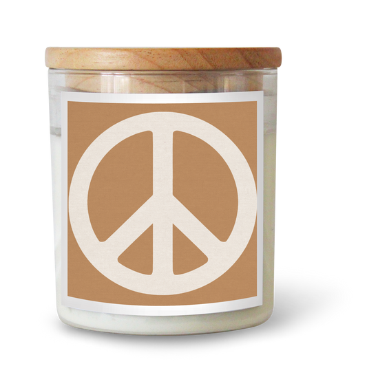 The Commonfolk scented candle with a tan peace sign on the label and a wooden lid.