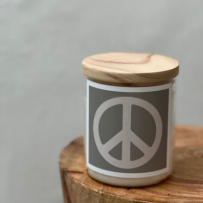 Jar with wooden lid and peace symbol on a gray background