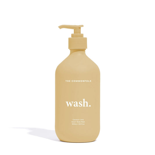 The Commonfolk yellow matte finish 500ml bottle with a pump dispenser labeled 'wash.'