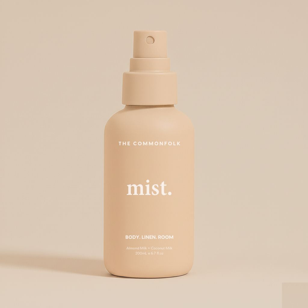 Nude spray bottle labeled 'mist' by 'The Commonfolk' on a beige background