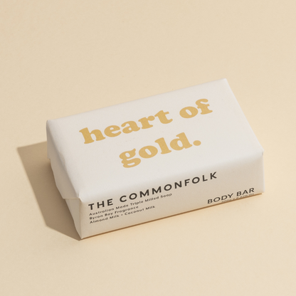 The Commonfolk 200g body bar soap with 'heart of gold' written on the top in simple white packaging.