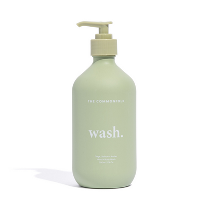 The Commonfolk matte green 500ml bottle of hand and body wash with a pump dispenser, labeled 'wash.' 