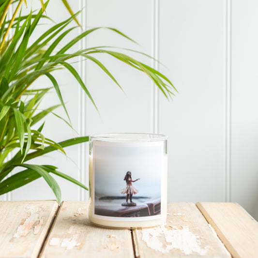 A candle featuring a photo of a girl, creating a personalized and sentimental decorative piece.
